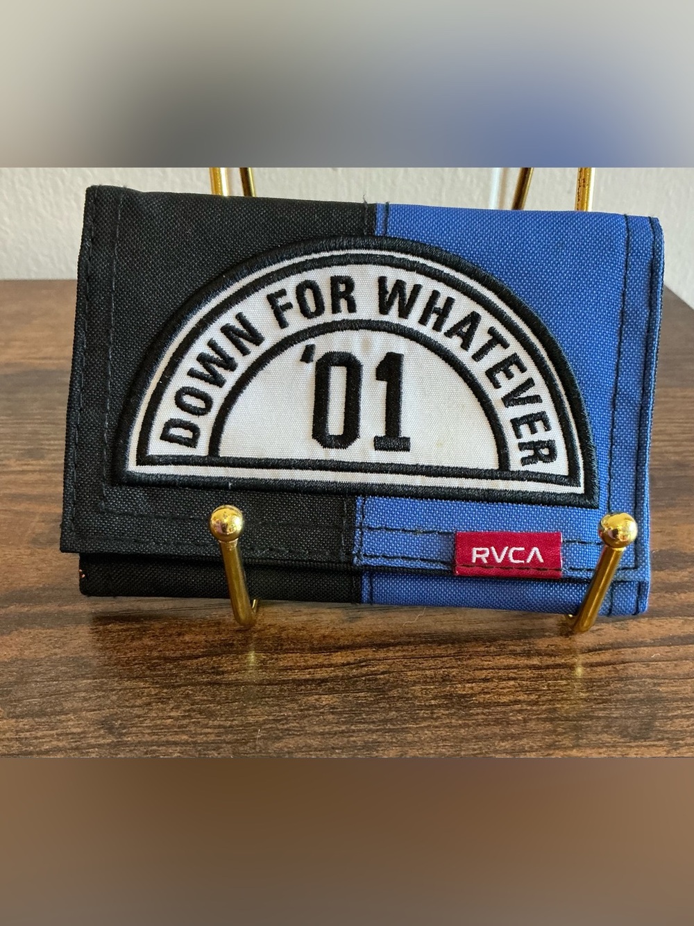 A rare vintage RVCA Down for Whatever 01 blue and black canvas trifold wallet